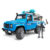 Bruder Внедорожник полицейский Land Rover Defender Station Wagon с фигуркой